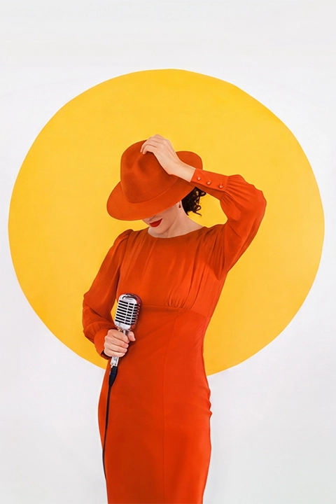 Woman in red with microphone